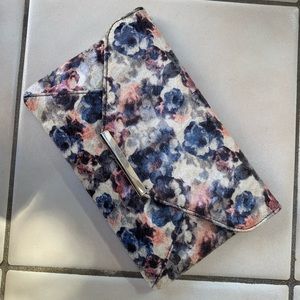 Floral clutch with magnetic closure.